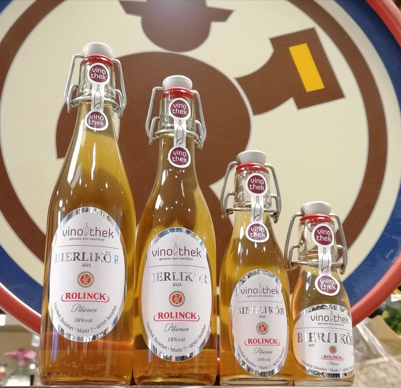 Vier Flaschen Bierlikör aus Rolinck Pilsener in unterschiedlichen Größen